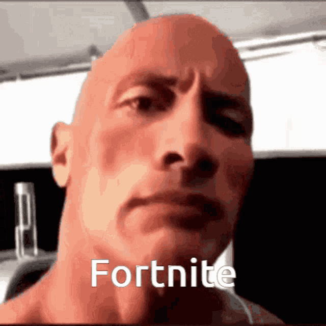 a close up of a man 's face with the word fortnite written on it