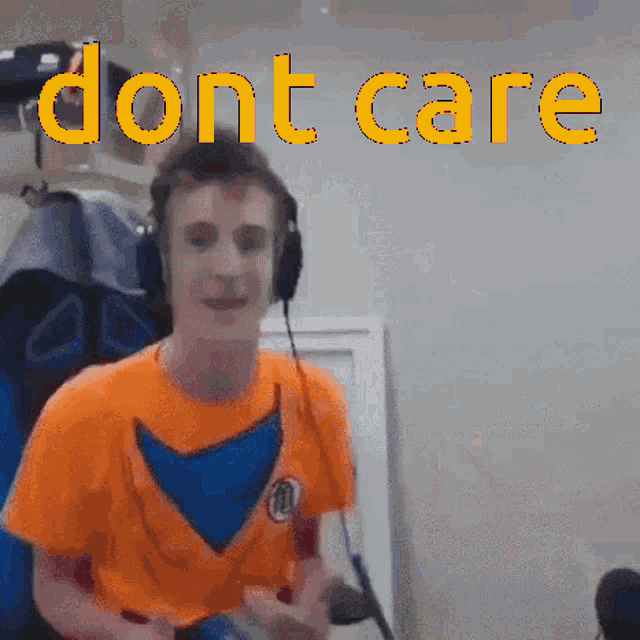 a man wearing headphones and an orange shirt says " dont care " in yellow