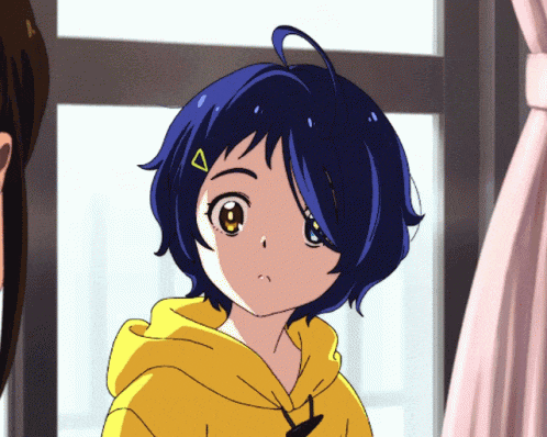 a girl with blue hair is wearing a yellow hoodie and has a triangle on her head