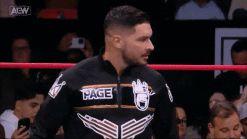 a wrestler wearing a black jacket that says page on it