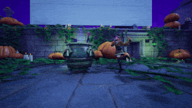 a woman in a witch costume is standing next to a cauldron with pumpkins in the background
