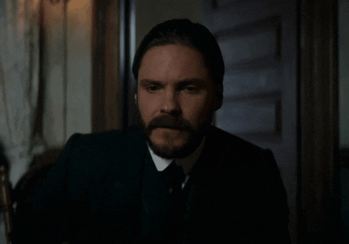 a man with a beard says she gave it to herself in a dark room