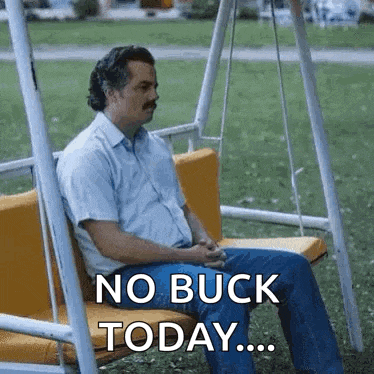 a man is sitting on a swing and saying no buck today ...