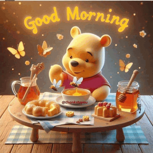 winnie the pooh is sitting at a table with a bowl of honey and butterflies flying around him .