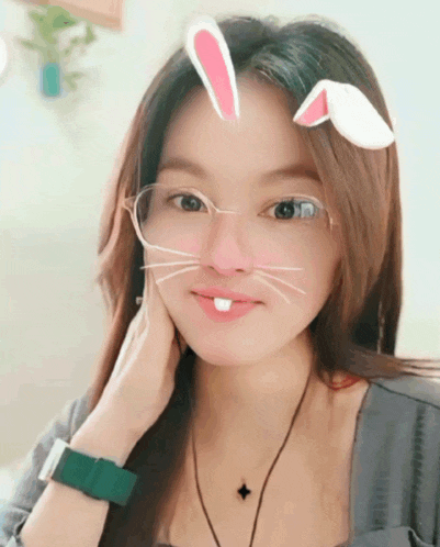 a woman with bunny ears on her head