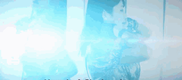 a blue background with a few letters in the corner