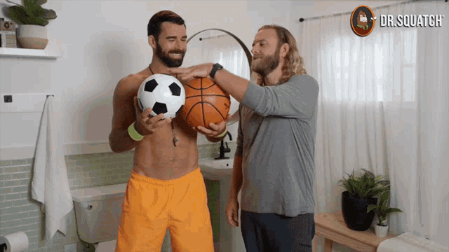 a man holding a basketball and a soccer ball next to another man holding a basketball