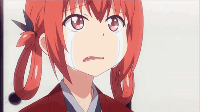 a girl with red hair is crying with a white tear coming out of her mouth