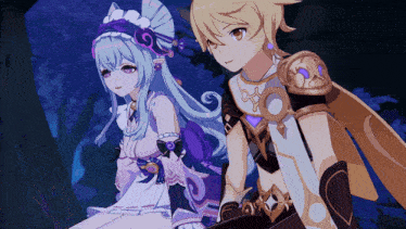 a boy and a girl standing next to each other