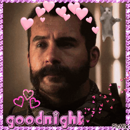 a man with a beard and mustache is surrounded by hearts and says goodnight
