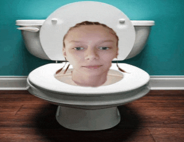 a woman is sitting in a toilet with her head sticking out