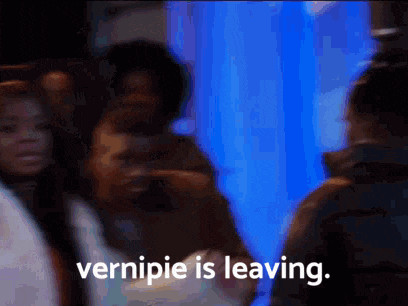 a blurry picture of a group of people with the words vernipie is leaving on the bottom