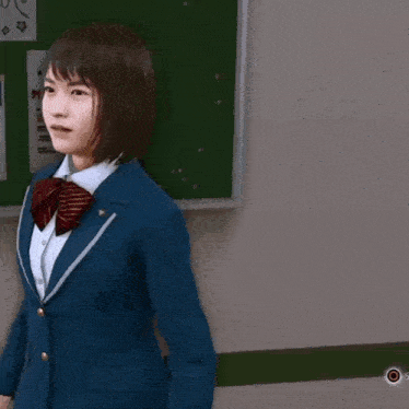 a girl in a school uniform is standing in a hallway .