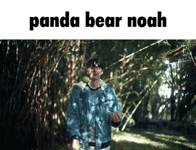 a man in a denim jacket is holding a green apple and the words panda bear noah are above him
