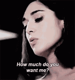 a close up of a woman 's face with the words `` how much do you want me '' .