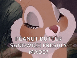 a cartoon bunny with its eyes closed and the words peanut butter sandwich freshly made