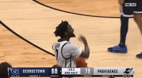 a basketball game between georgetown and providence with the score 68 to 78