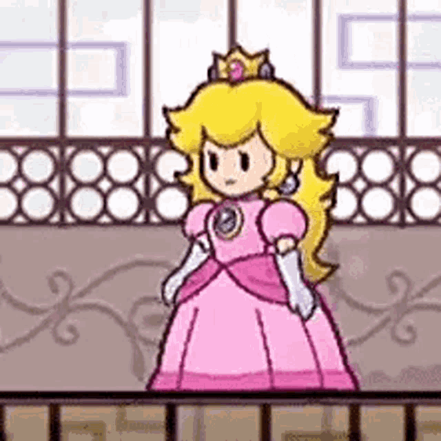 princess peach is wearing a pink dress and a crown and is standing on a balcony .