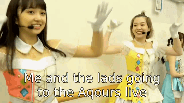 a girl with a microphone on her head and the words me and the lads going to the aqours live