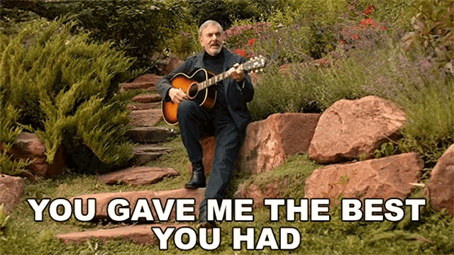 a man playing a guitar with the words you gave me the best you had