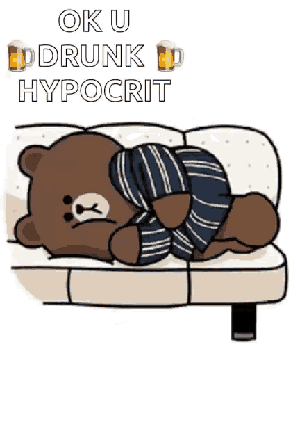 a brown teddy bear is laying on a couch with a beer in the background .