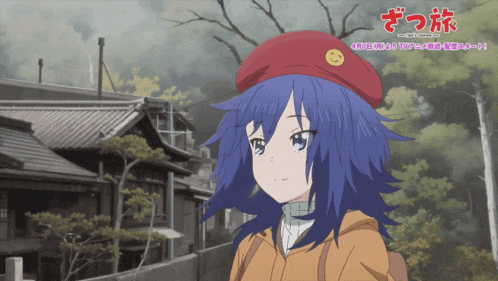 a girl with blue hair is wearing a red hat with a smile on it