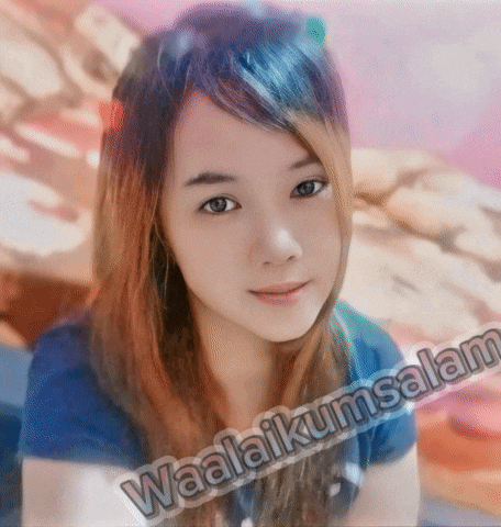 a girl with waalaikumsalam written on the bottom of her picture