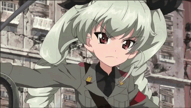 a girl with a ponytail and red eyes is standing in front of a brick building