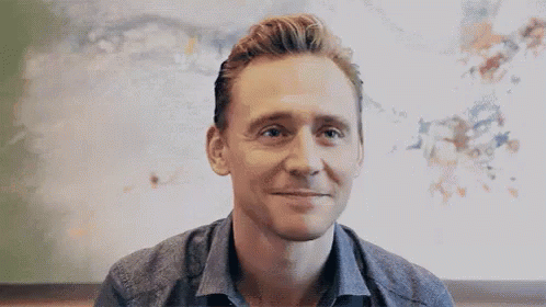 Tom Hiddleston GIF - Tom Hiddleston Happy GIFs
