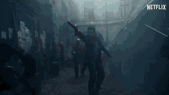 a man is holding a gun with a flame coming out of it in a scene from netflix