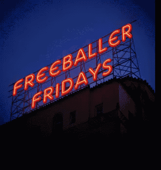 a neon sign that says freeballer fridays on it
