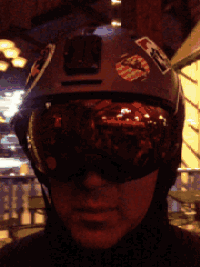 a man wearing a helmet and goggles has a sticker on his helmet that says ' i love you ' on it