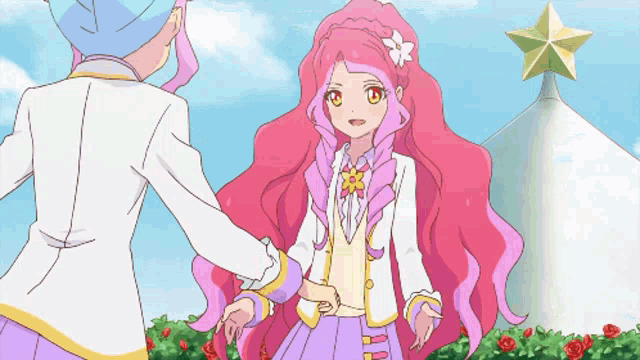 a girl with pink hair shakes hands with a boy