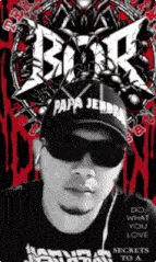 a man wearing a hat that says papa jendan on it