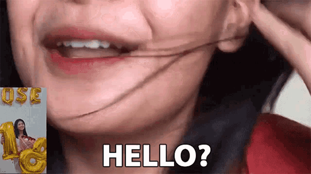 a close up of a woman 's face with the words " hello " on it