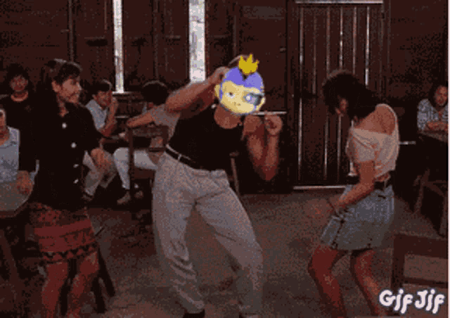 a group of people are dancing in a room with a gif that says gif jif at the bottom