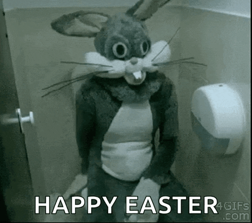 a person dressed as a bunny rabbit is sitting on a toilet in a bathroom .