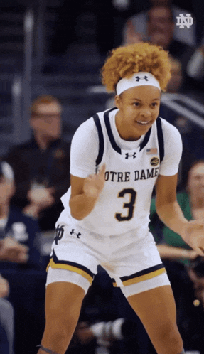 a female basketball player for notre dame wearing number 3