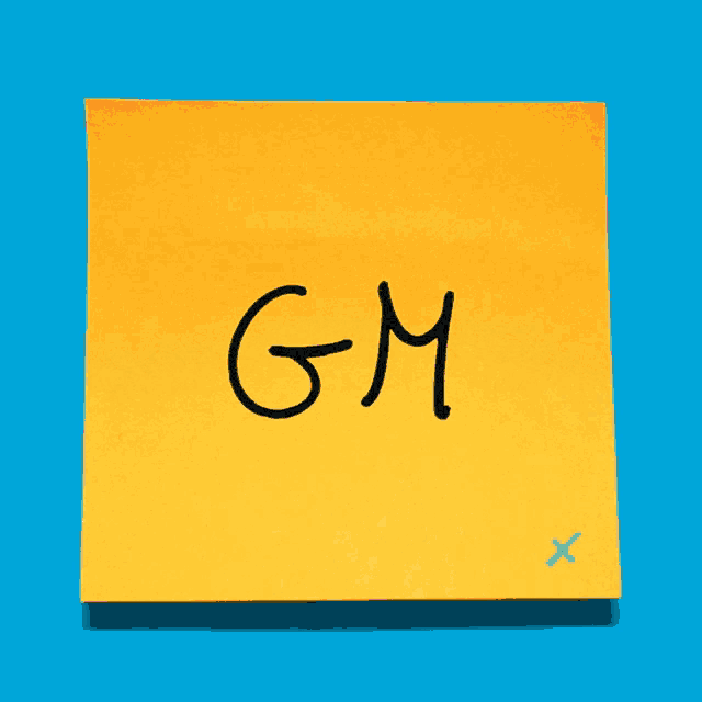 a yellow sticky note that says gm on it