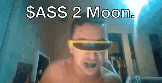 a shirtless man wearing sunglasses with the words sass 2 moon