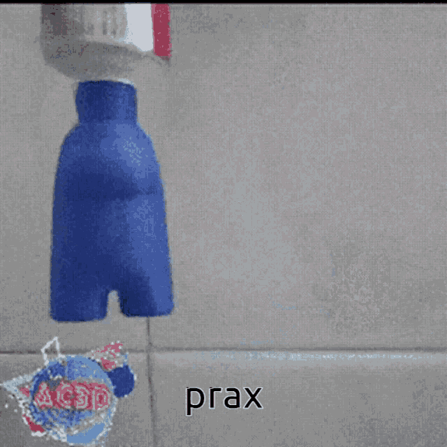a picture of a toothbrush with the word prax on the bottom right