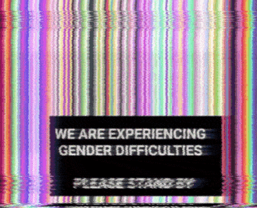 a rainbow colored background with a sign that says `` we are experiencing gender difficulties '' .