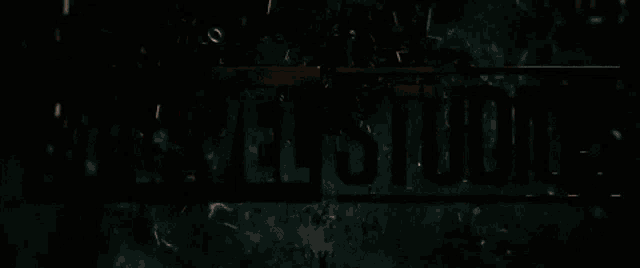 a logo for marvel studios is shown on a red background
