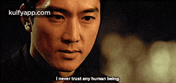 a man says " i never trust any human being " in a movie scene