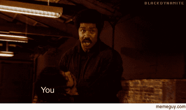 a man with a mustache is screaming with the words you done fucked up now