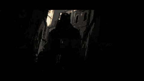 a blurred image of a person 's face with a glowing light behind them