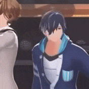 a man and a woman are standing next to each other in a video game .