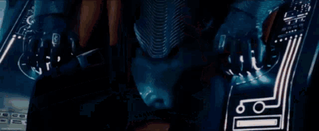 a blurred image of a person 's face with the letter r on the bottom