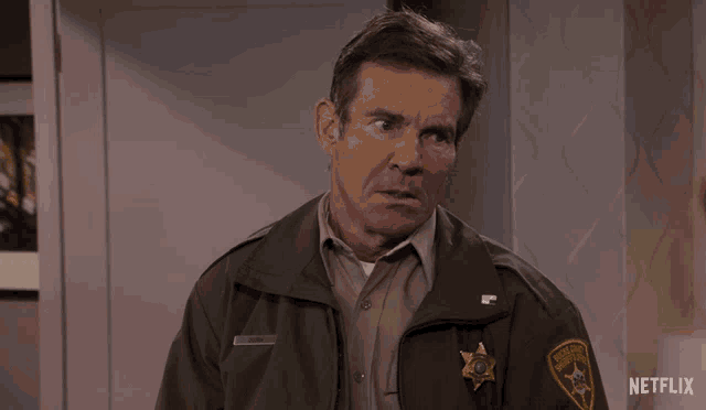 a man in a sheriff 's uniform has a netflix logo on the bottom right