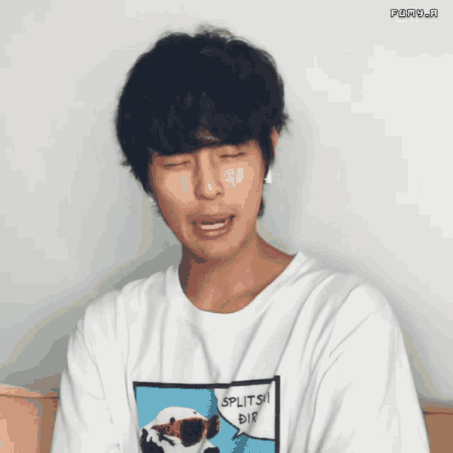 a man with his eyes closed is wearing a shirt that says masipag